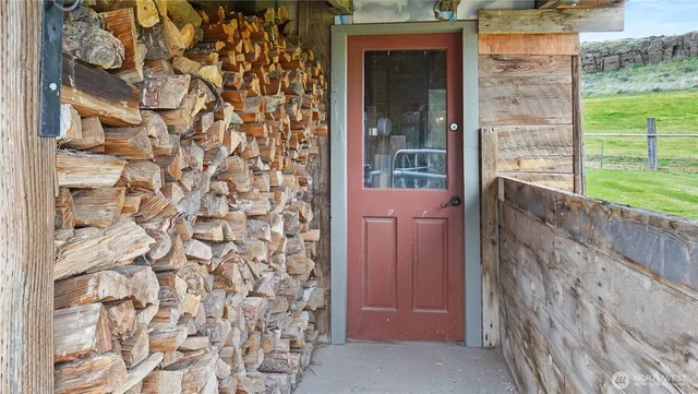 a bathroom with a shower curtain and a sink