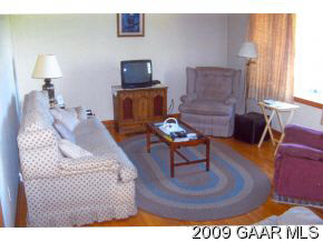 1528 Middlebrook Road Staunton, VA 24401 - Photo 4 of 12 a living room with furniture and a fireplace