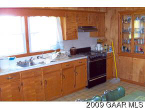 1528 Middlebrook Road Staunton, VA 24401 - Photo 5 of 12 a kitchen with stainless steel appliances granite countertop a sink stove and cabinets