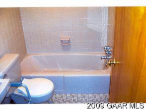 1528 Middlebrook Road Staunton, VA 24401 - Photo 7 of 12 a bathroom with a sink and a bathtub
