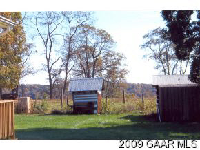 1528 Middlebrook Road Staunton, VA 24401 - Photo 9 of 12 a view of backyard with large trees