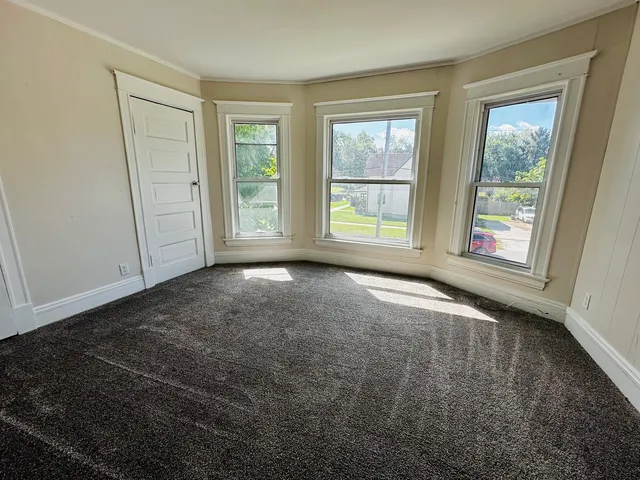 an empty room with windows