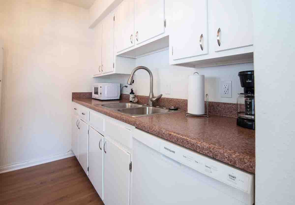 810 Bellevue Road, Unit 290 Nashville, TN 37221 - Photo 22 of 38 a kitchen with sink and a dishwasher