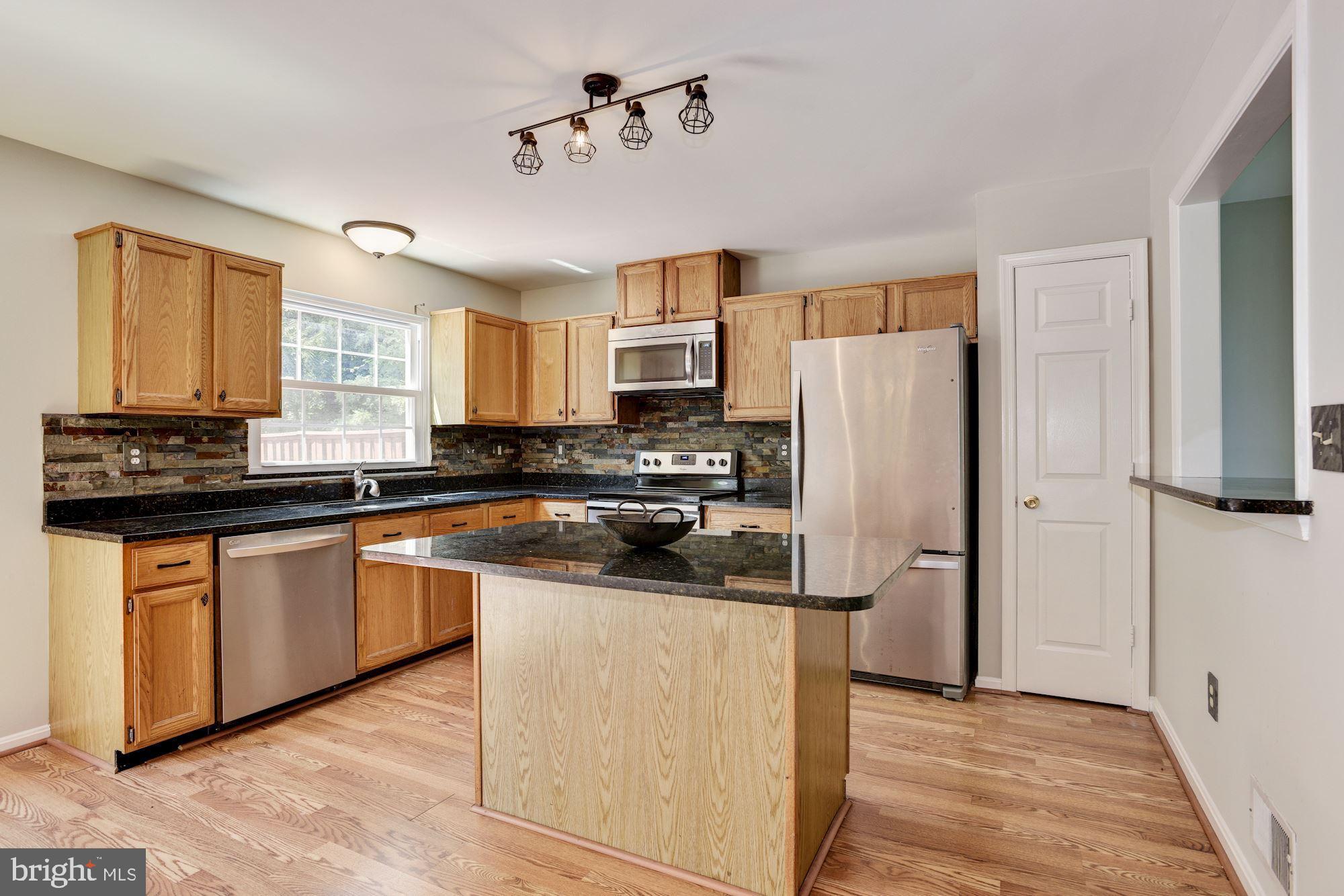 235 Gentlebrook Road Owings Mills, MD 21117 - Photo 8 of 30 Eat-In Kitchen | Breakfast Bar