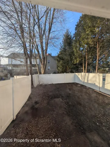 a view of yard with trees