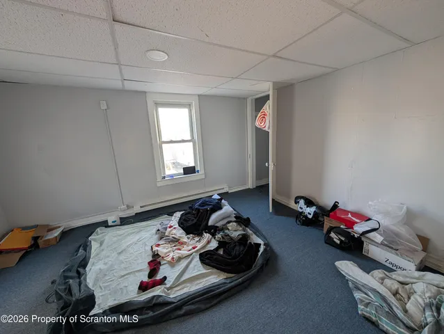 a room with furniture and a window