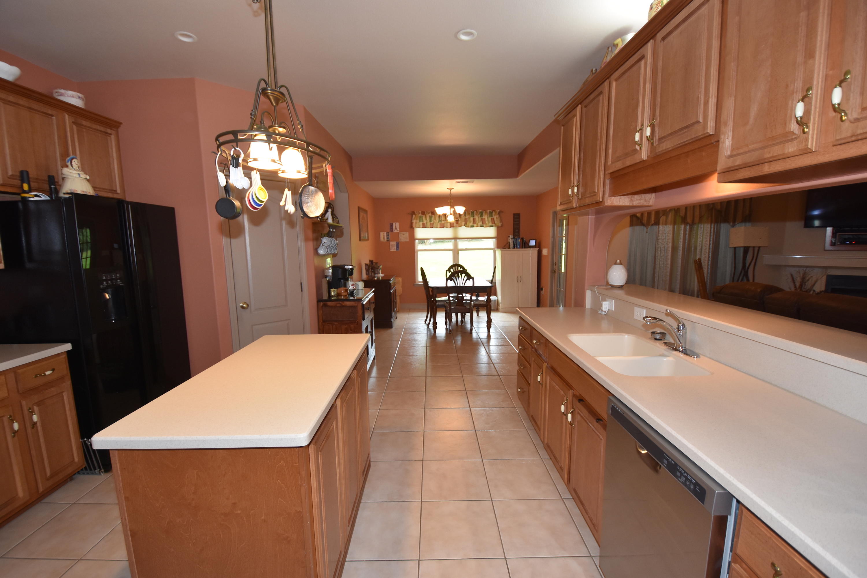 6000 Gagnon Road Crestview, FL 32539 - Photo 17 of 51 a large kitchen with stainless steel appliances lots of counter space and breakfast area