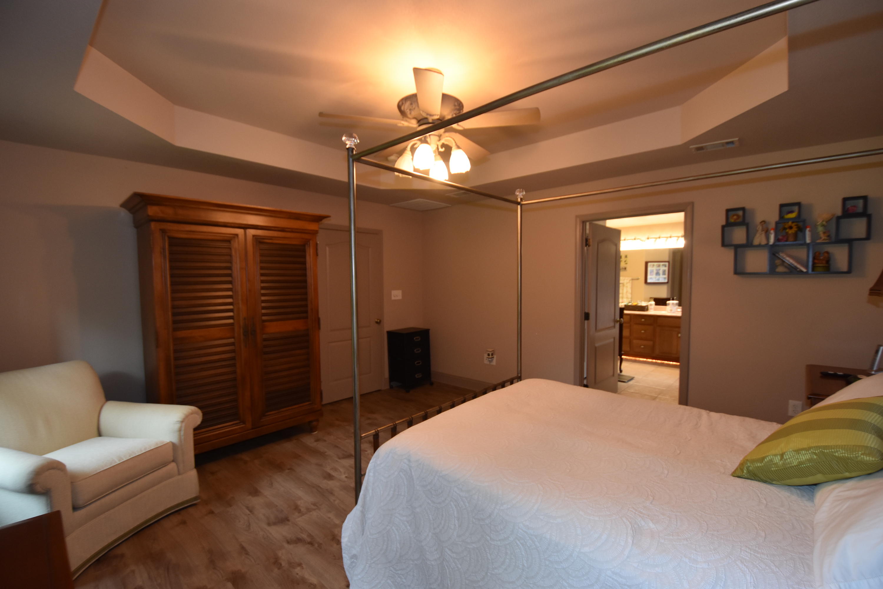 6000 Gagnon Road Crestview, FL 32539 - Photo 20 of 51 a bedroom with a bed and a couch