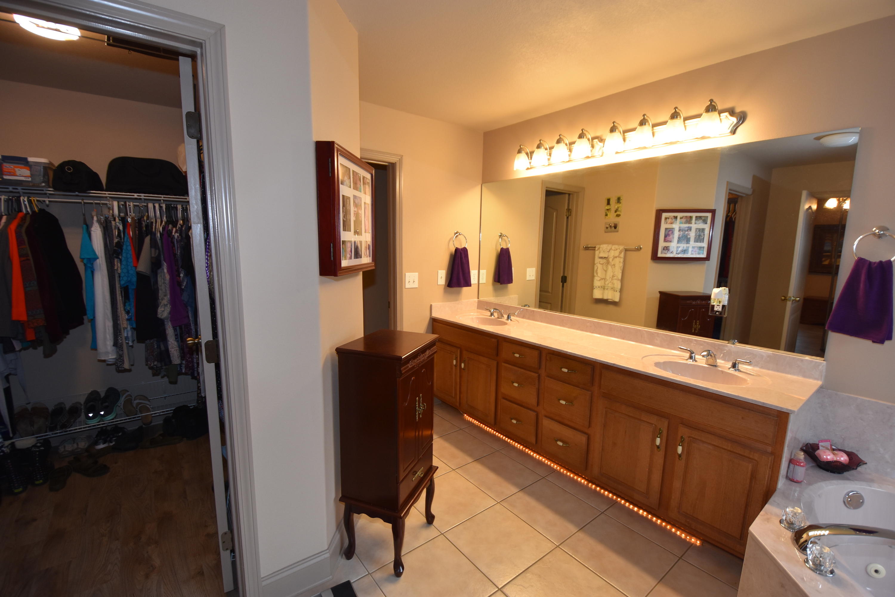 6000 Gagnon Road Crestview, FL 32539 - Photo 23 of 51 a spacious bathroom with a double vanity sink and a mirror