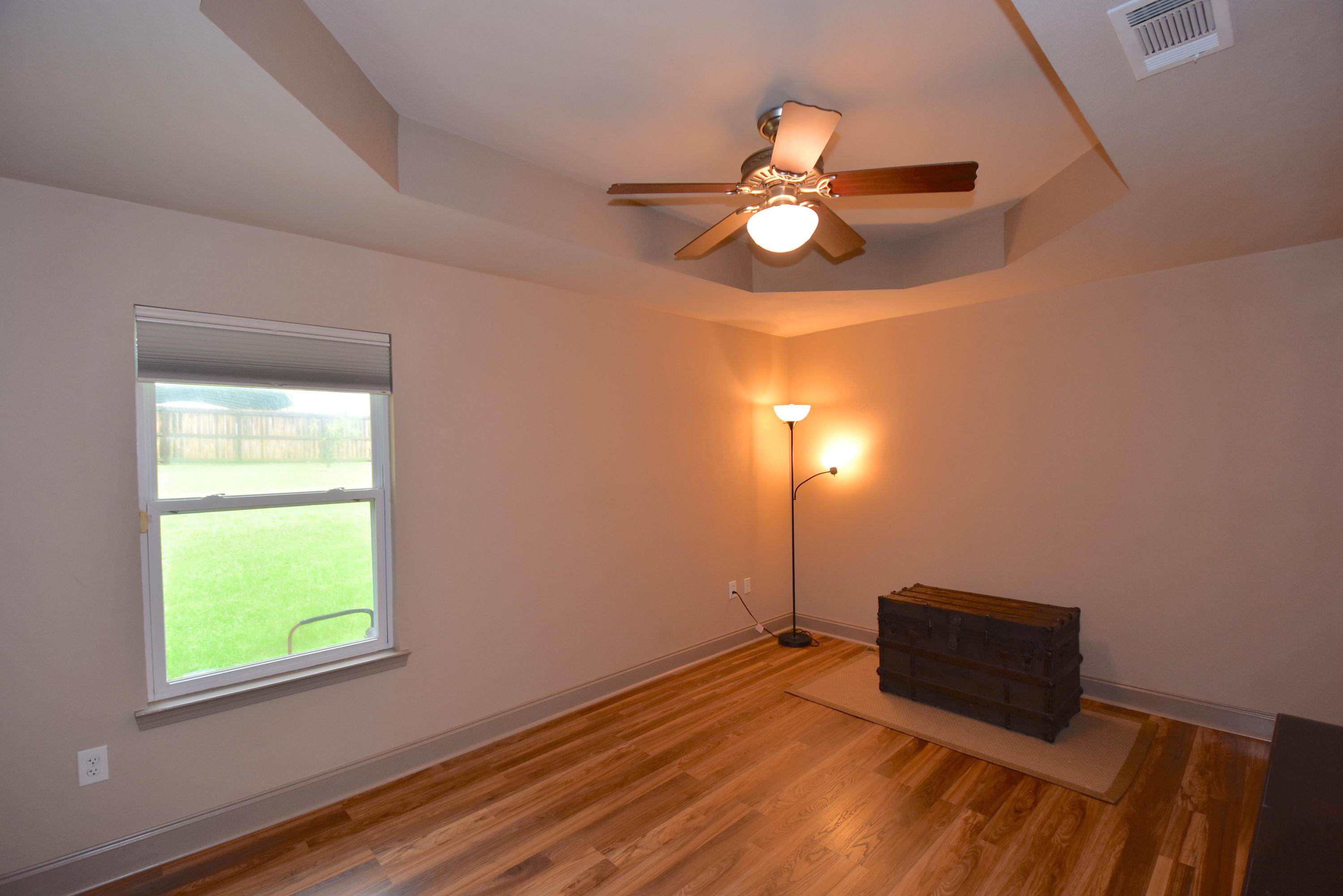 6000 Gagnon Road Crestview, FL 32539 - Photo 28 of 51 a room with window and wooden floor