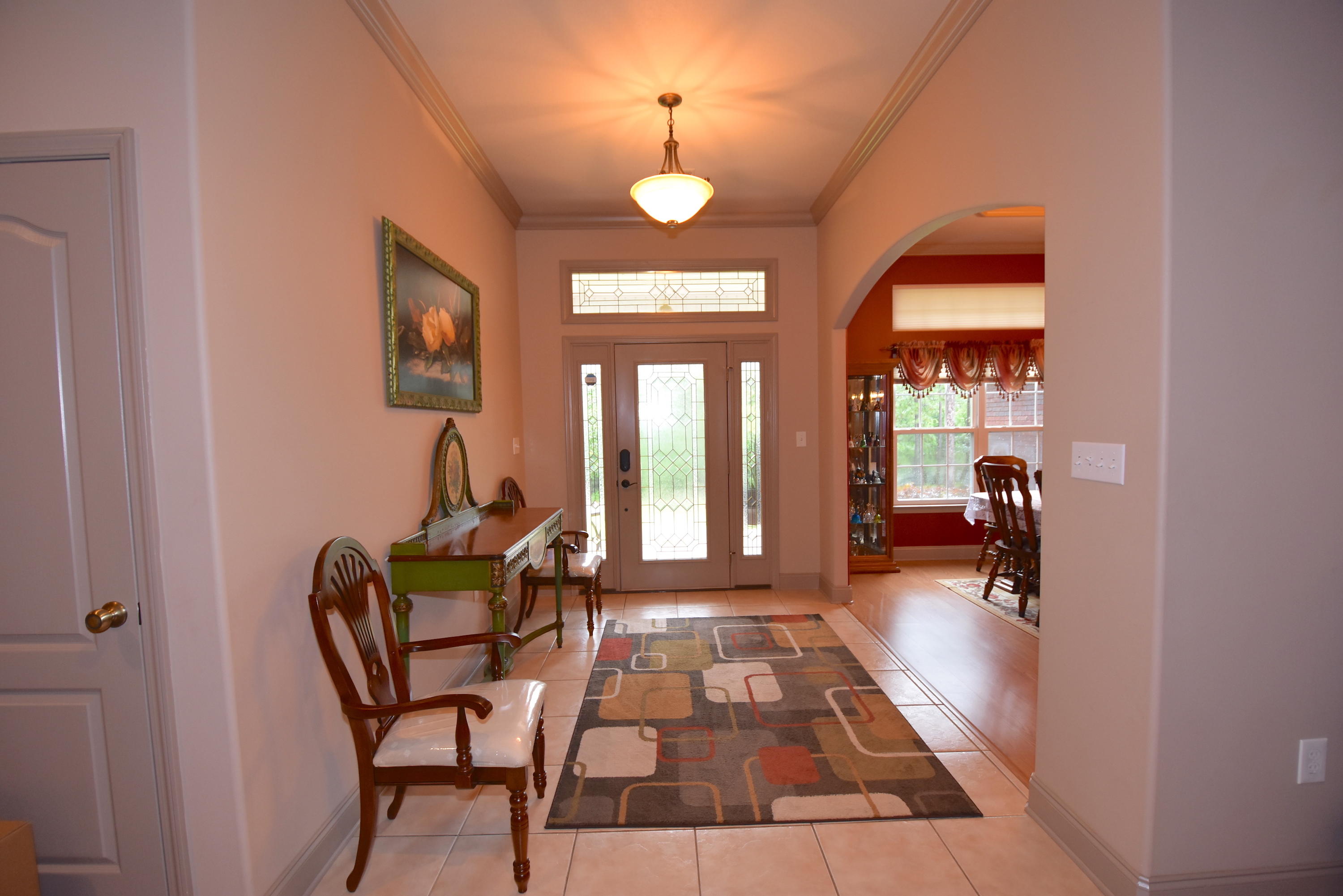 6000 Gagnon Road Crestview, FL 32539 - Photo 35 of 51 a room with chairs and a potted plant