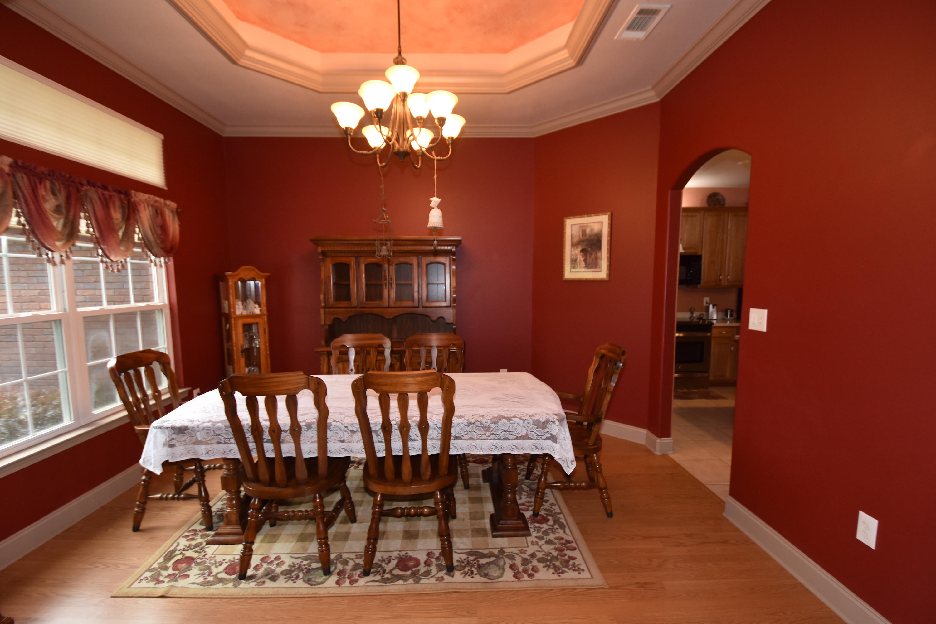 6000 Gagnon Road Crestview, FL 32539 - Photo 4 of 51 a view of a dining room with furniture and chandelier