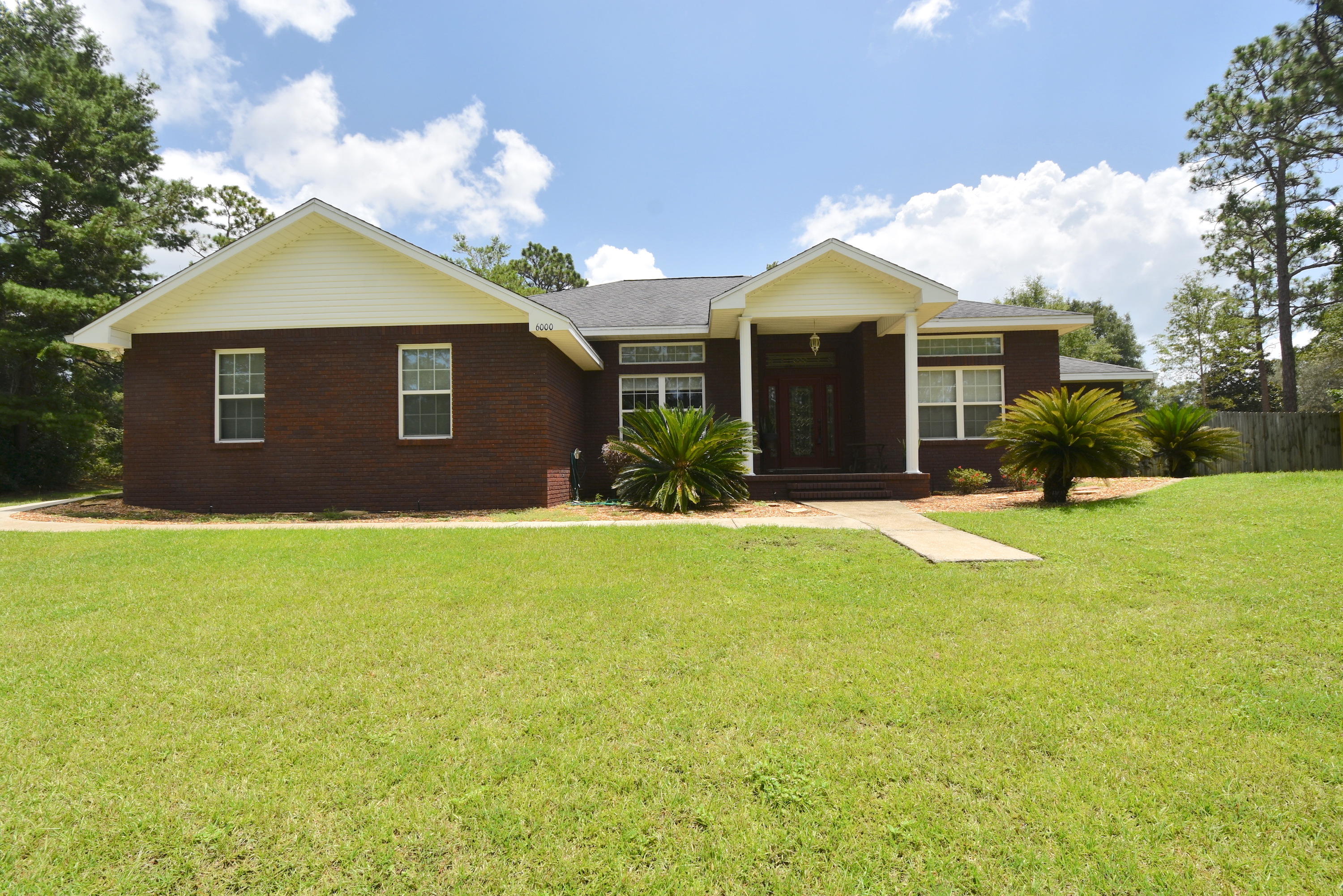 6000 Gagnon Road Crestview, FL 32539 - Photo 50 of 51 a front view of house with yard and green space