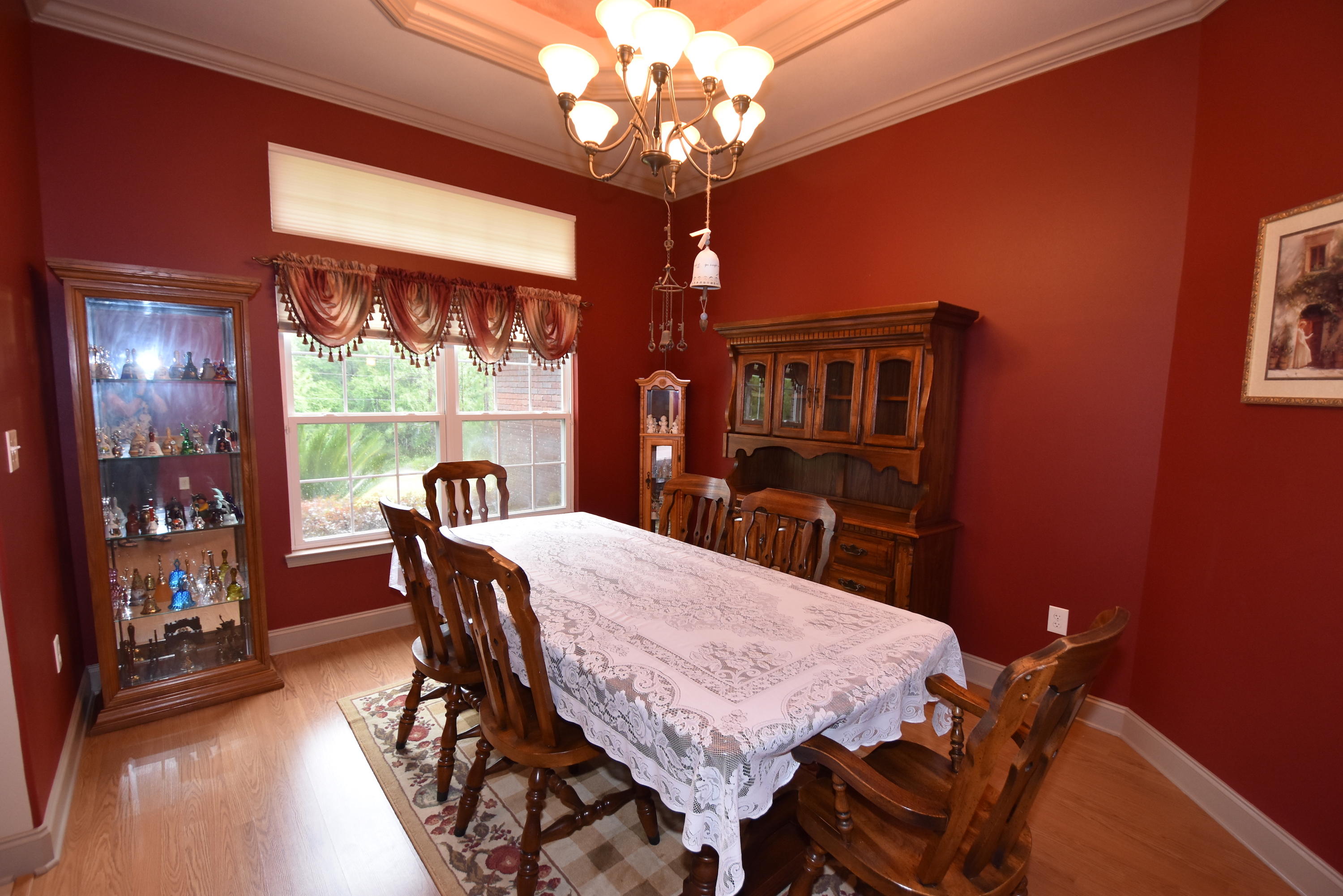 6000 Gagnon Road Crestview, FL 32539 - Photo 5 of 51 a view of a dining room with furniture wooden floor and chandelier