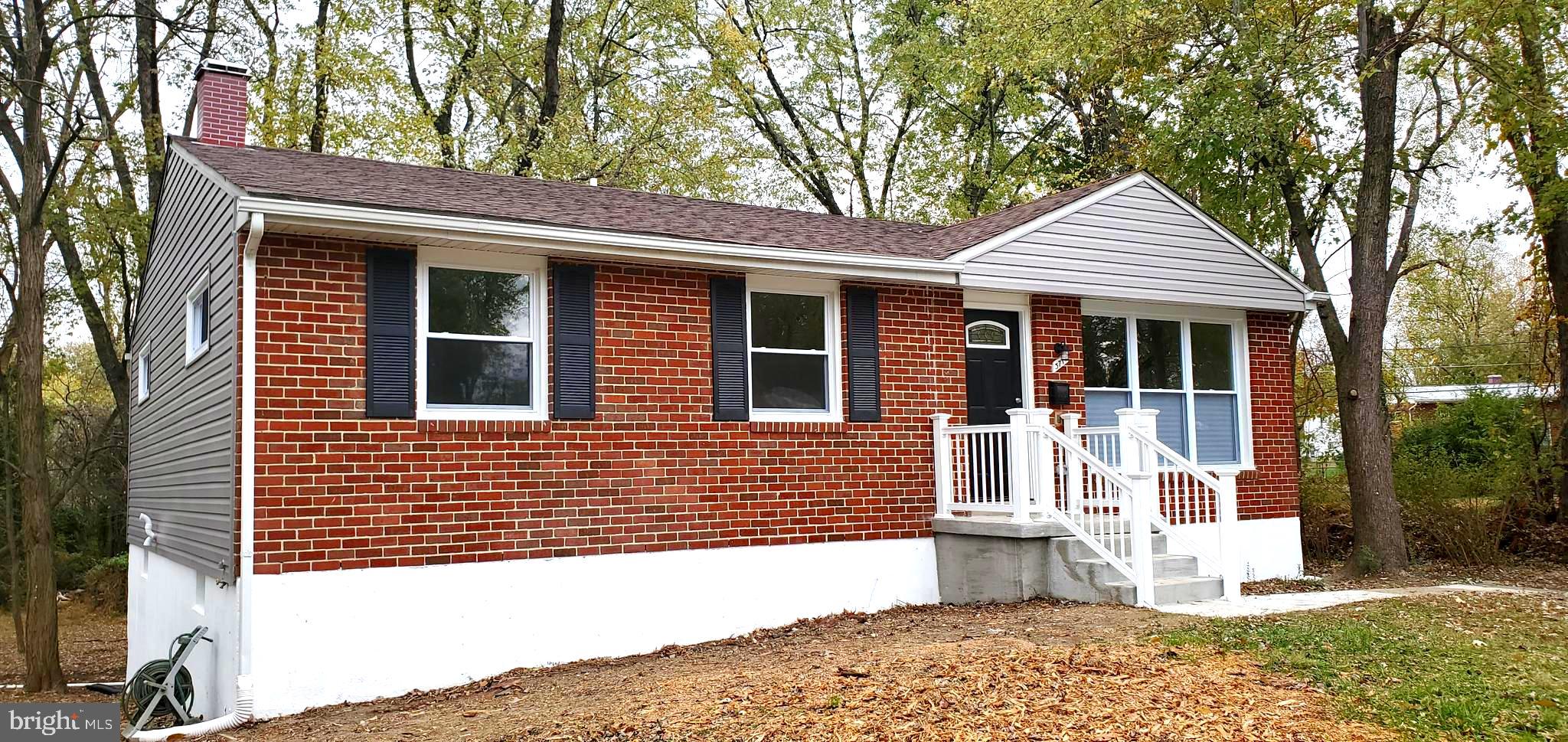 3713 Cassen Road Randallstown, MD 21133 - Photo 2 of 27 a view of a house with a yard and large tree