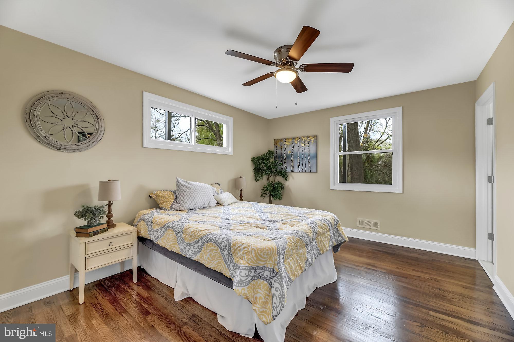 3713 Cassen Road Randallstown, MD 21133 - Photo 13 of 27 a bedroom with a bed and a window
