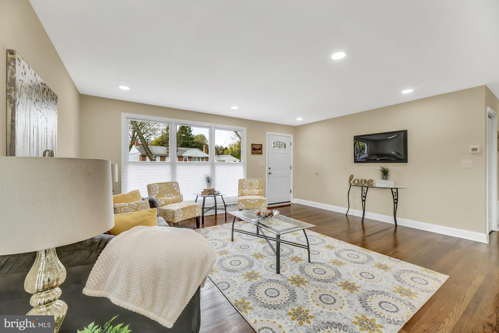 3713 Cassen Road Randallstown, MD 21133 - Photo 4 of 27 a living room with furniture and a flat screen tv