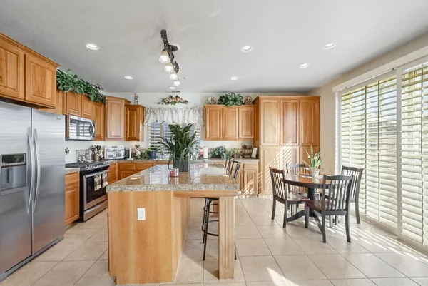 a view of a dining room with furniture
