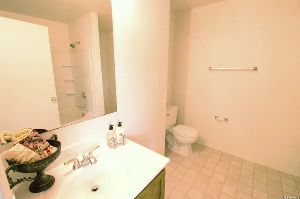 a bathroom with a sink and a toilet