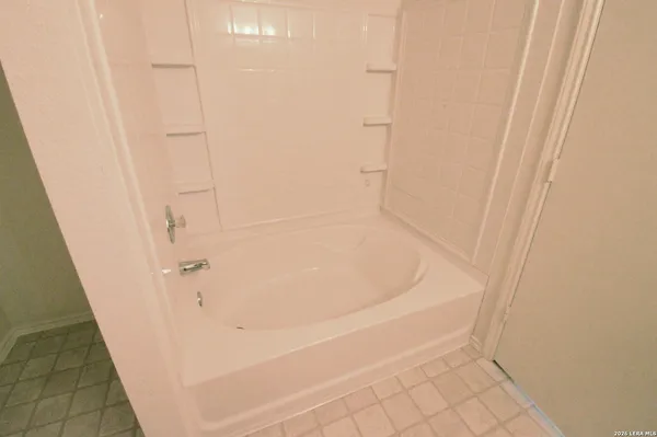 a bathroom with a bathtub