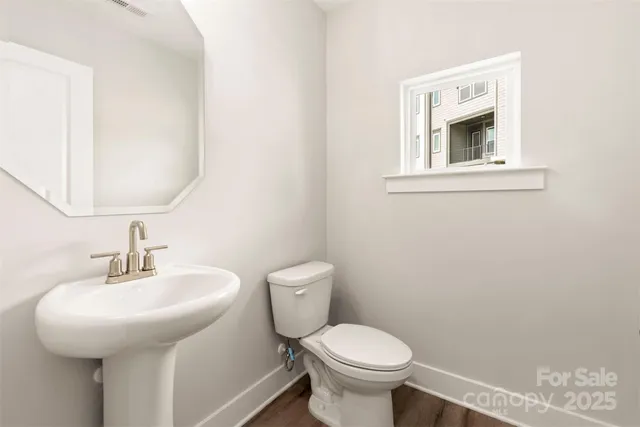 a bathroom with a sink and a toilet