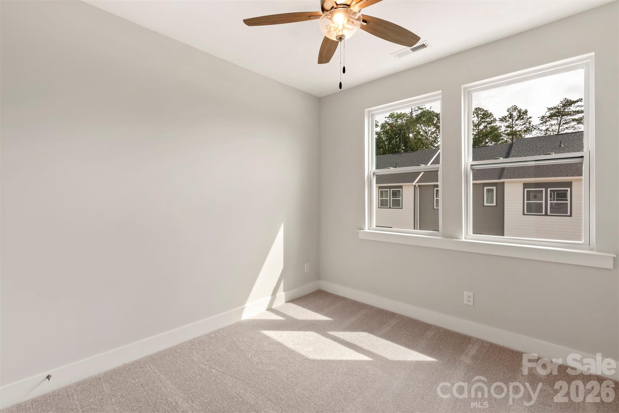 429 Nathaniel Way, Unit BRX0032 Charlotte, NC 28213 - Photo 32 of 43 a view of an empty room with a window