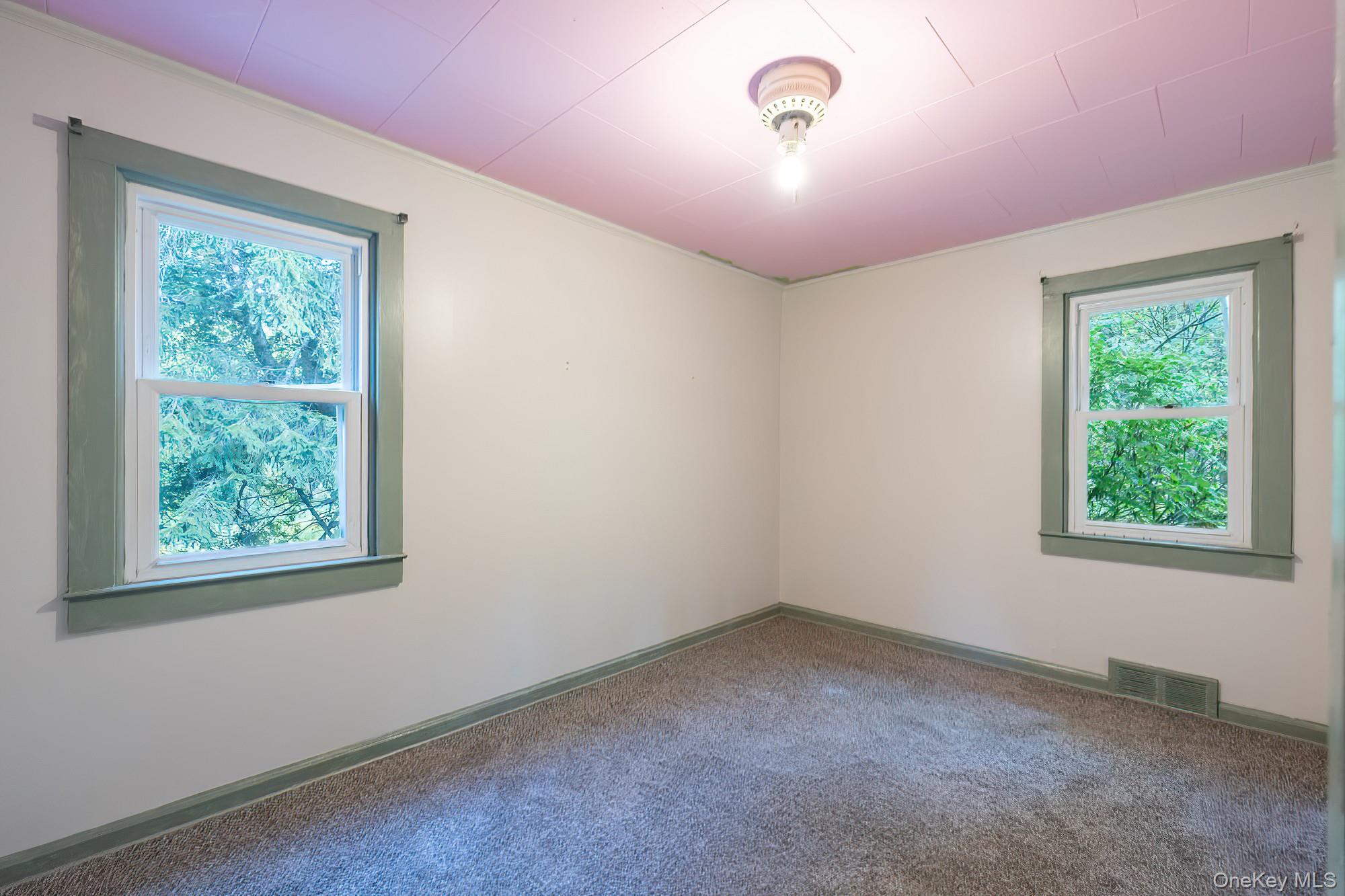 240 Stevers Crossing Road Hudson, NY 12534 - Photo 12 of 21 Carpeted spare room featuring ornamental molding and baseboards