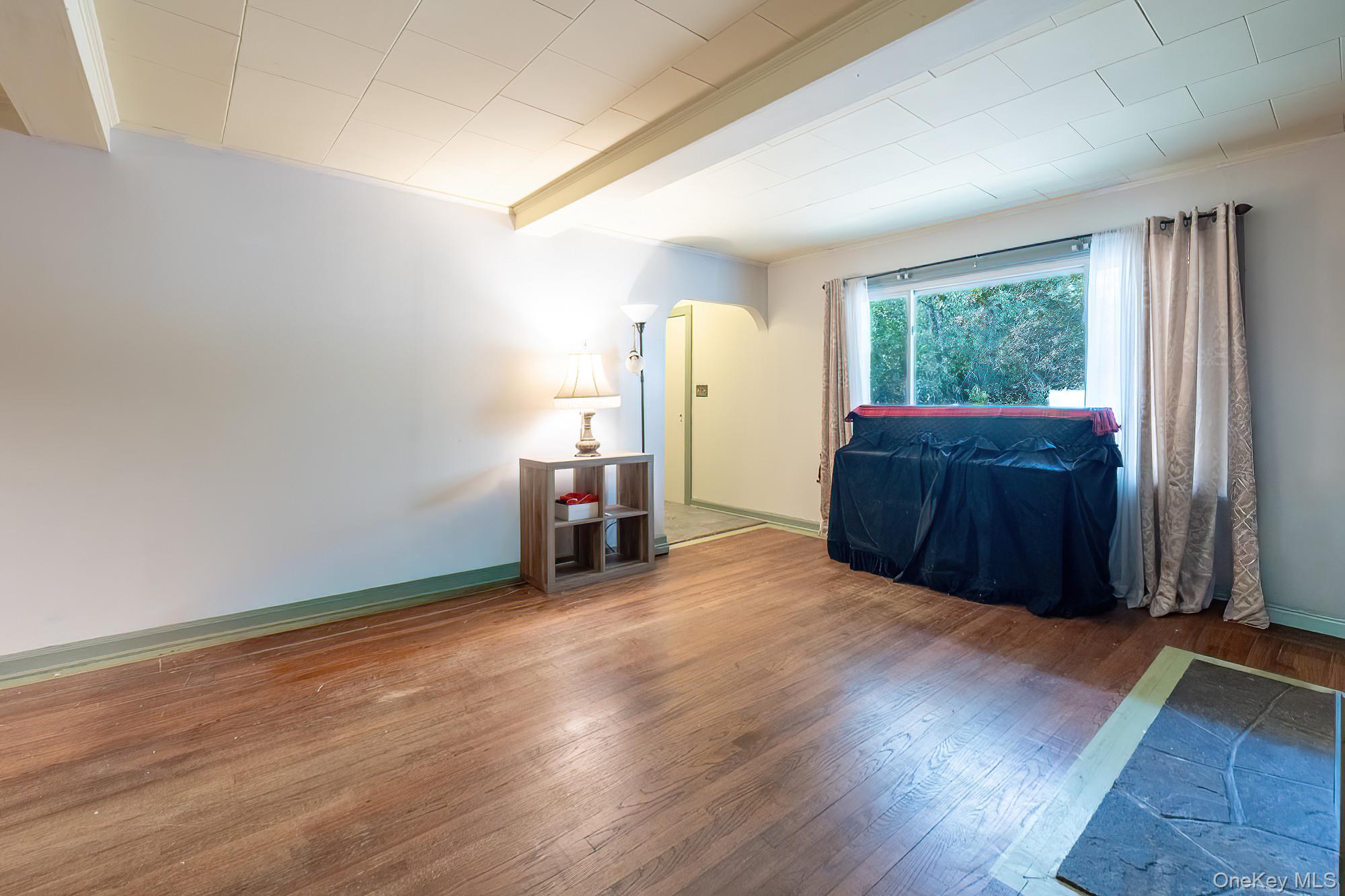 240 Stevers Crossing Road Hudson, NY 12534 - Photo 7 of 21 Spare room with beam ceiling and wood-type flooring