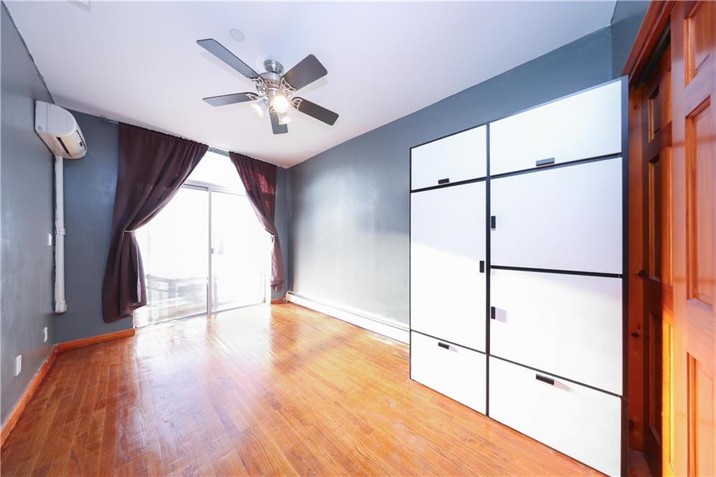 2265 West 7th Street, Unit 3B Brooklyn, NY 11223 - Photo 13 of 17 a view of an empty room with a window
