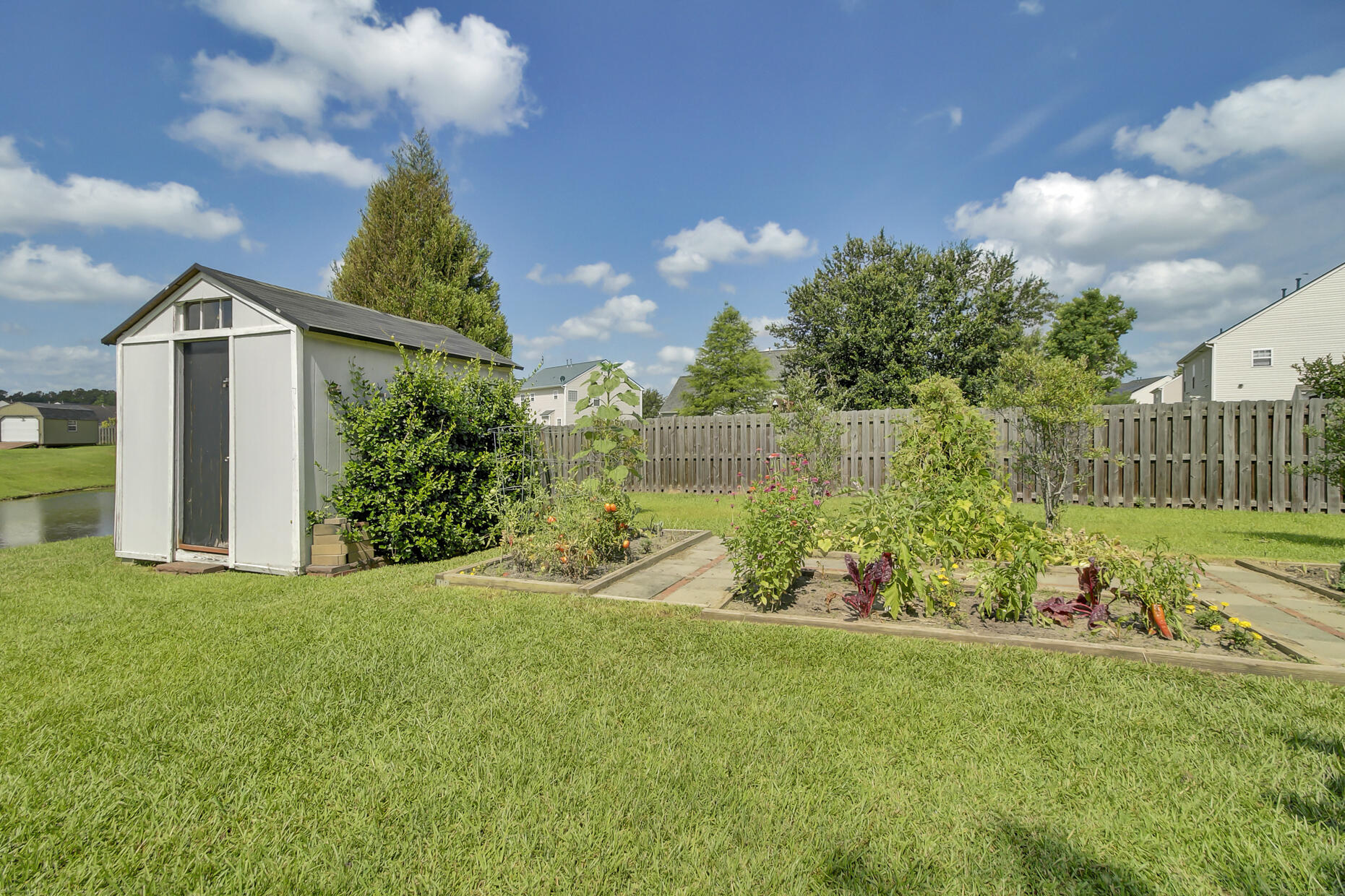 8022 Mckayla Road Summerville, SC 29483 - Photo 48 of 56 Backyard garden and storage