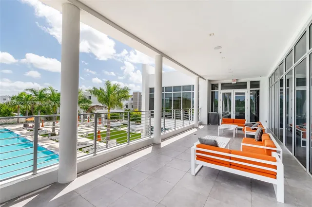 a sitting area with view of outdoor space