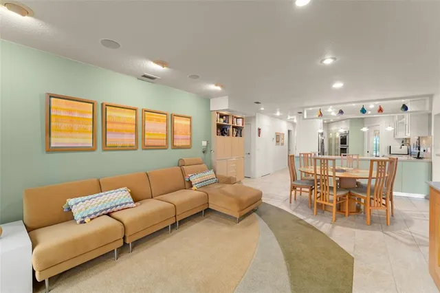 a kitchen with a sink cabinets and window