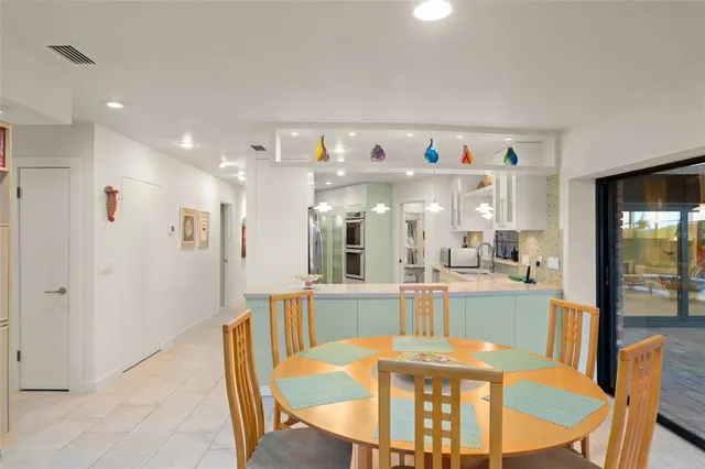 a kitchen with stainless steel appliances cabinets and a counter top space