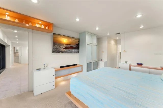 a bathroom with a toilet and shower