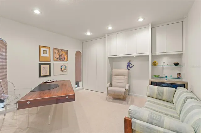 a bathroom with a double vanity sink toilet and shower