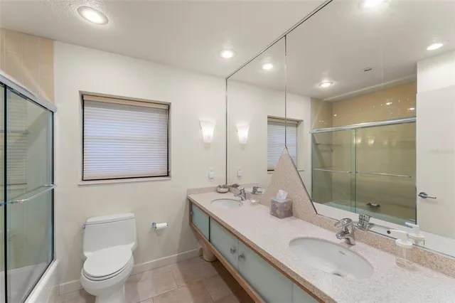 a view of a backyard with a swimming pool