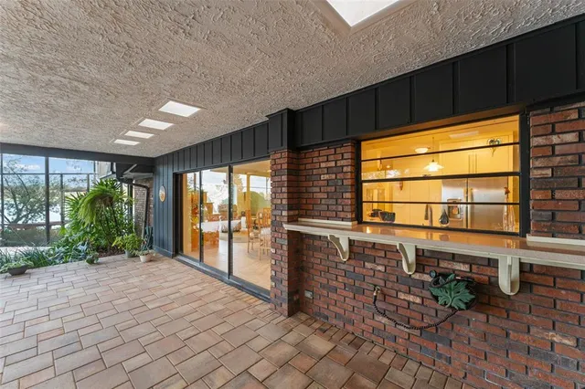 a view of a swimming pool with a yard