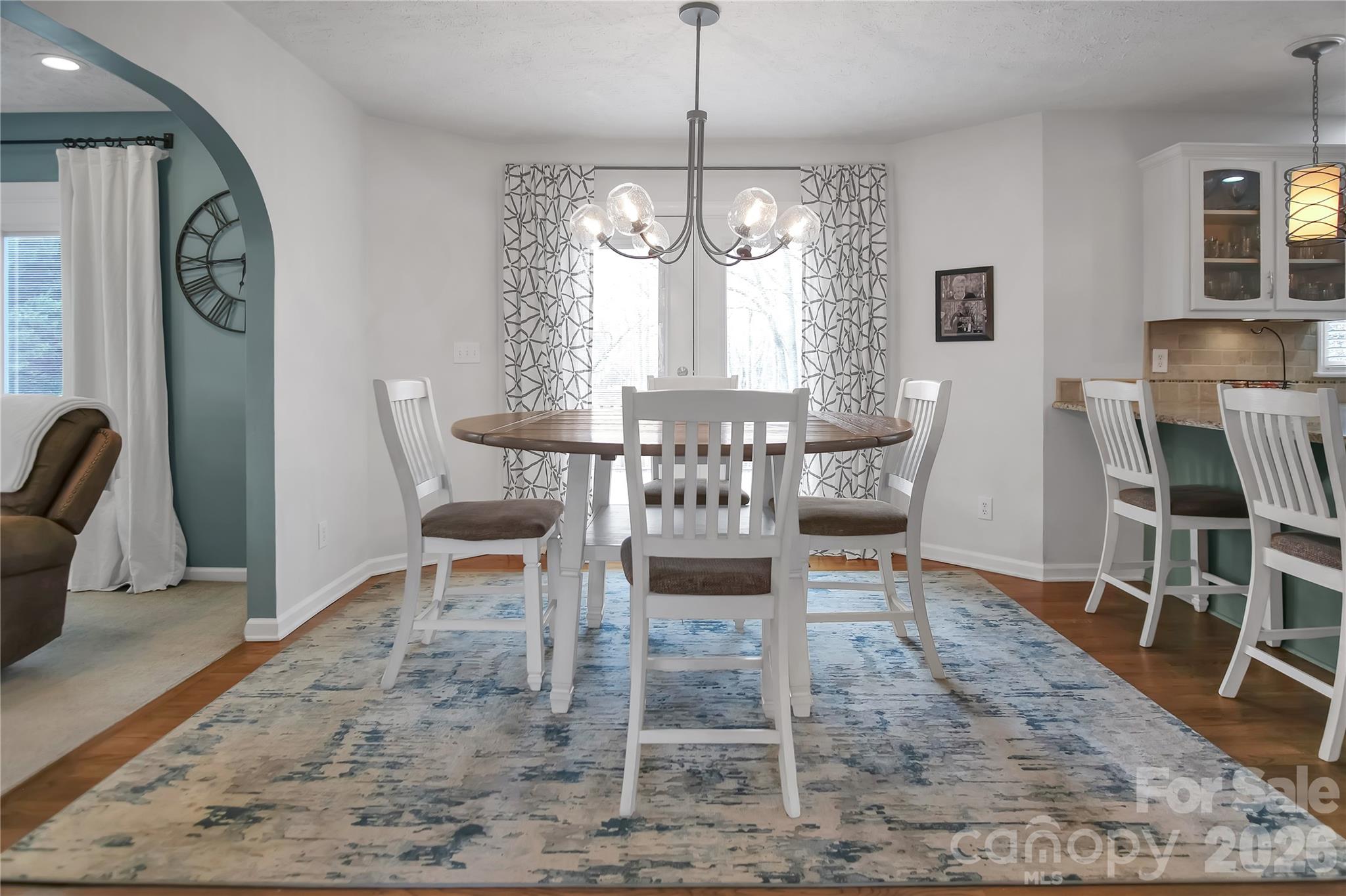 120 Oak Point Drive Cherryville, NC 28021 - Photo 14 of 44 a view of a dining room with furniture and wooden floor