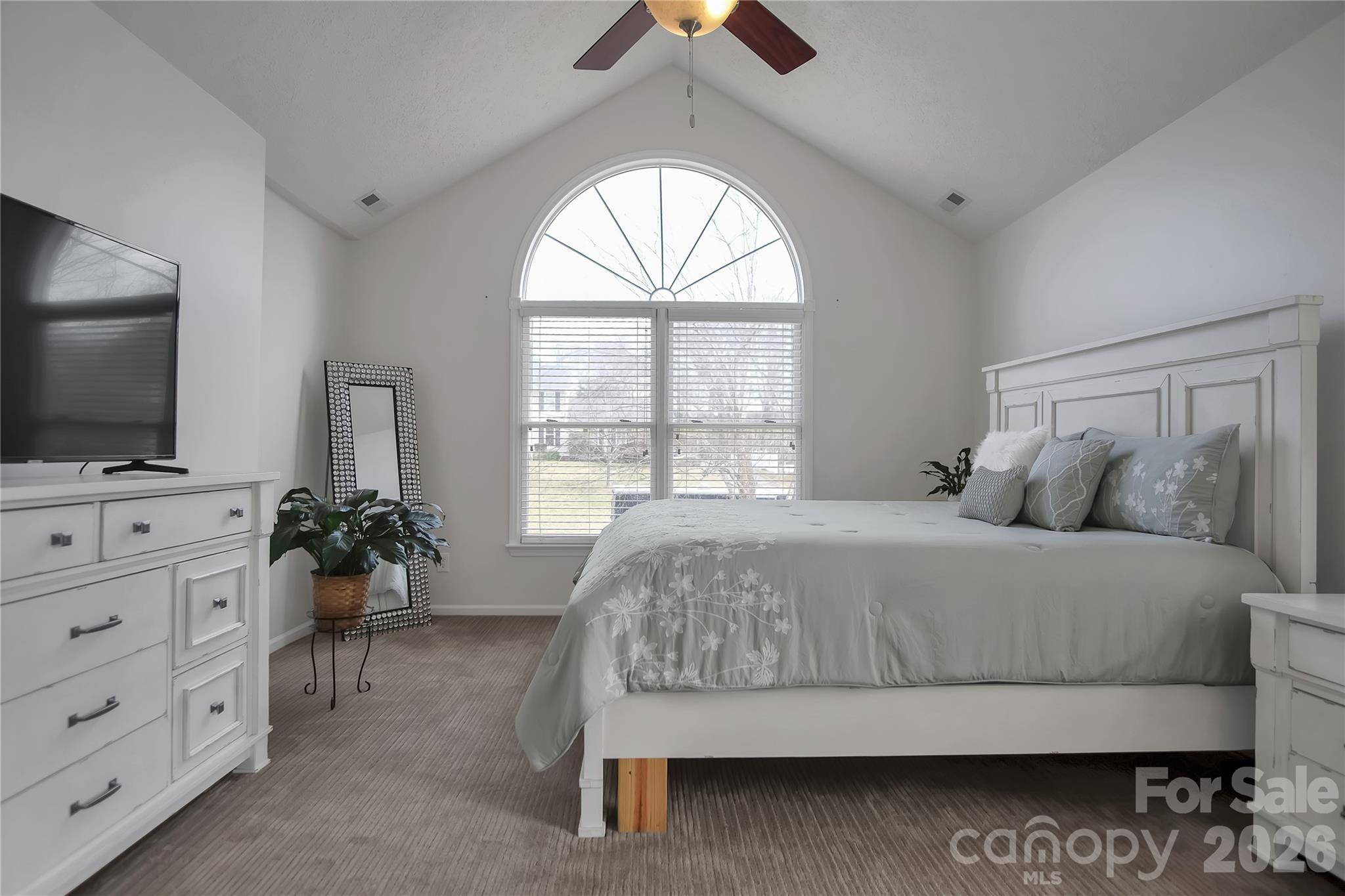 120 Oak Point Drive Cherryville, NC 28021 - Photo 20 of 44 a bedroom with a bed and a flat screen tv