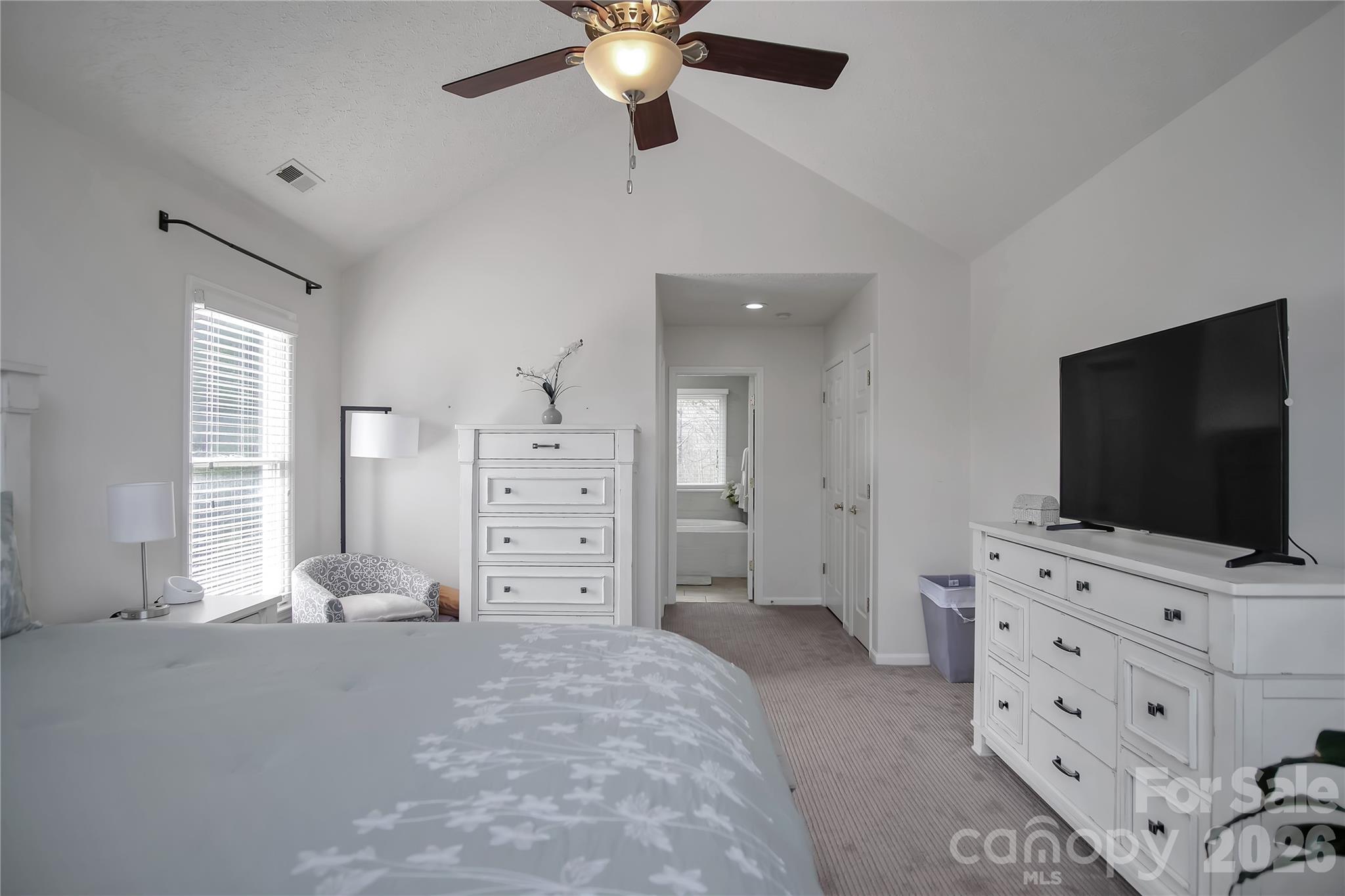 120 Oak Point Drive Cherryville, NC 28021 - Photo 21 of 44 a bedroom with a bed and a flat screen tv