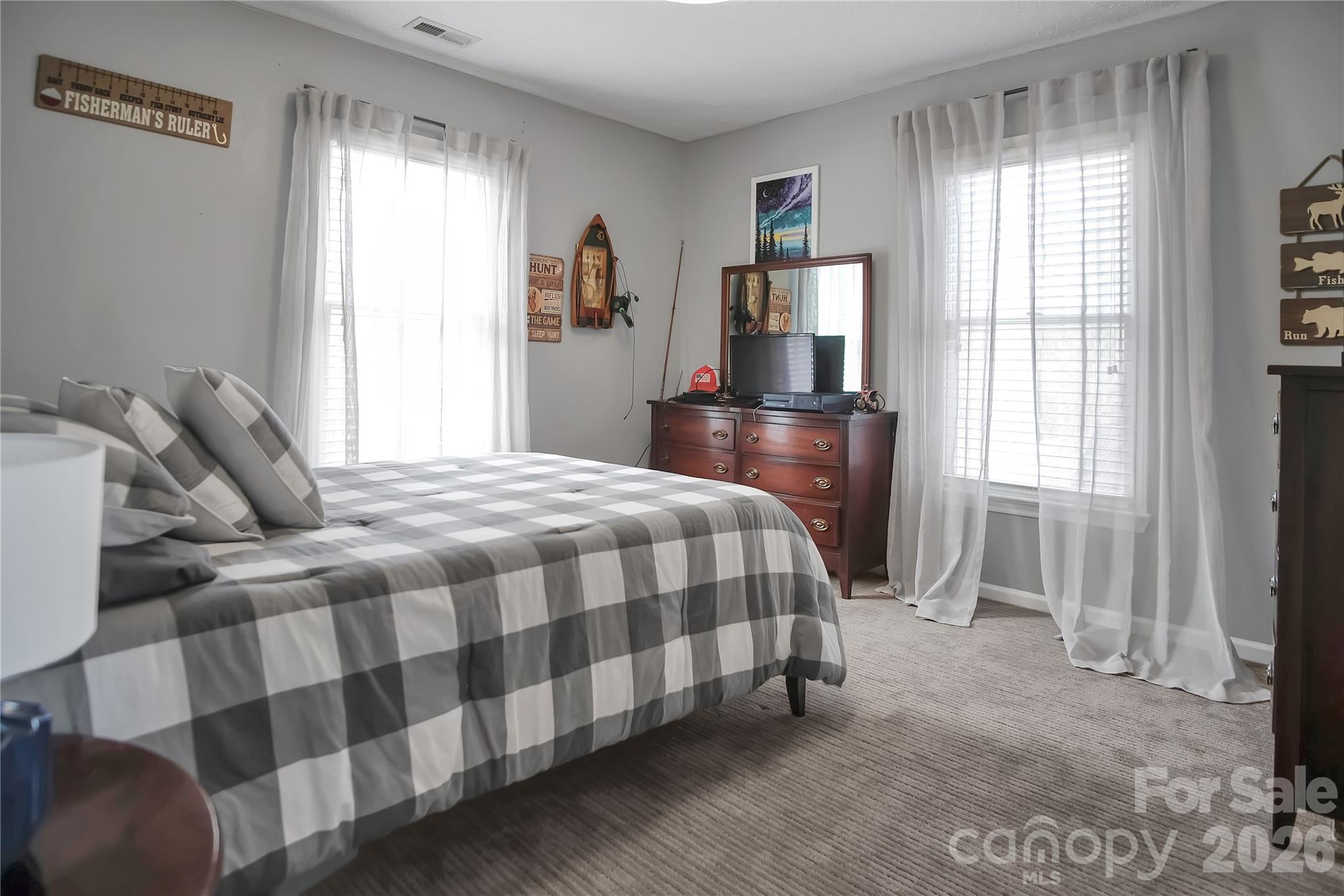 120 Oak Point Drive Cherryville, NC 28021 - Photo 29 of 44 a bedroom with a bed and wooden floor