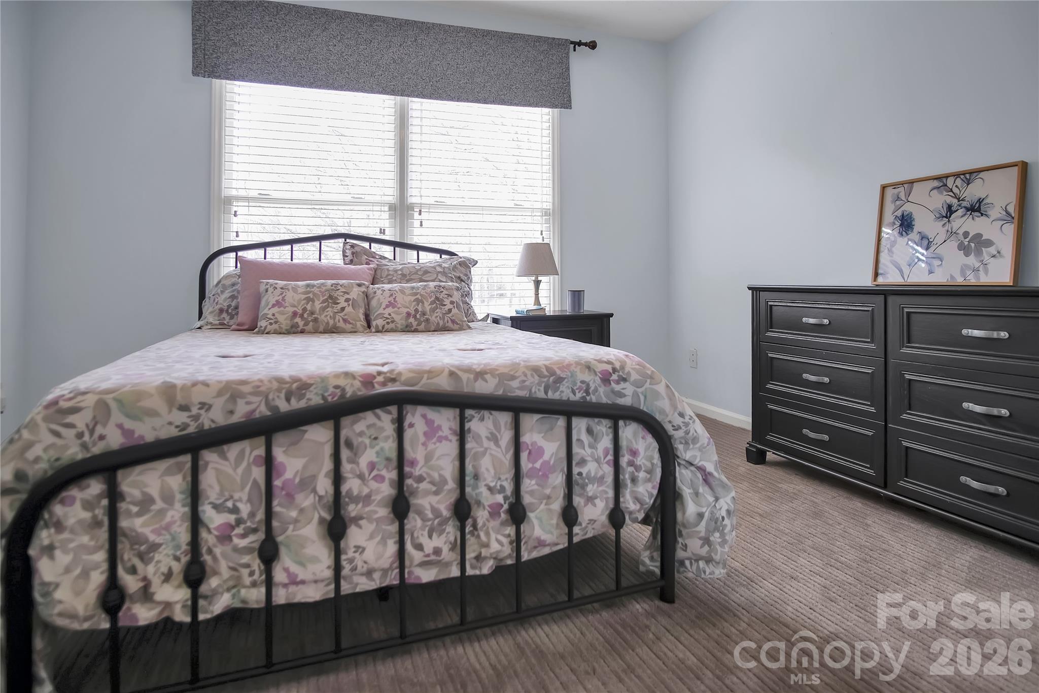 120 Oak Point Drive Cherryville, NC 28021 - Photo 30 of 44 a bedroom with a bed and window