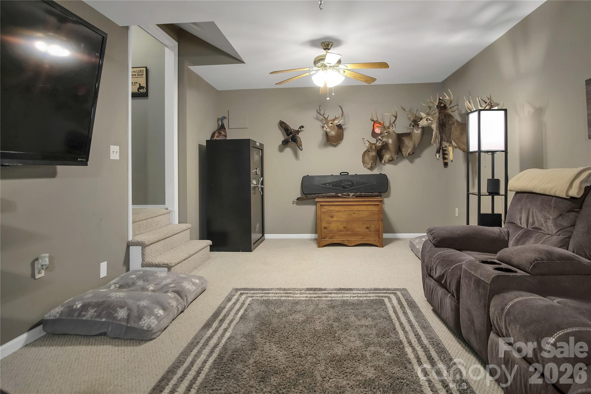 120 Oak Point Drive Cherryville, NC 28021 - Photo 33 of 44 a living room with furniture and a flat screen tv