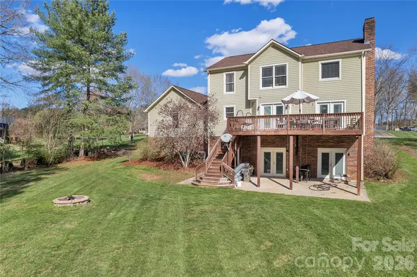 a view of swimming pool with lounge chair