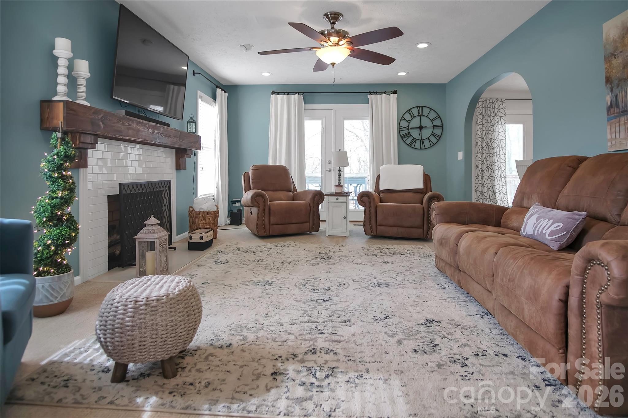 120 Oak Point Drive Cherryville, NC 28021 - Photo 9 of 44 a living room with furniture a fireplace and a large mirror