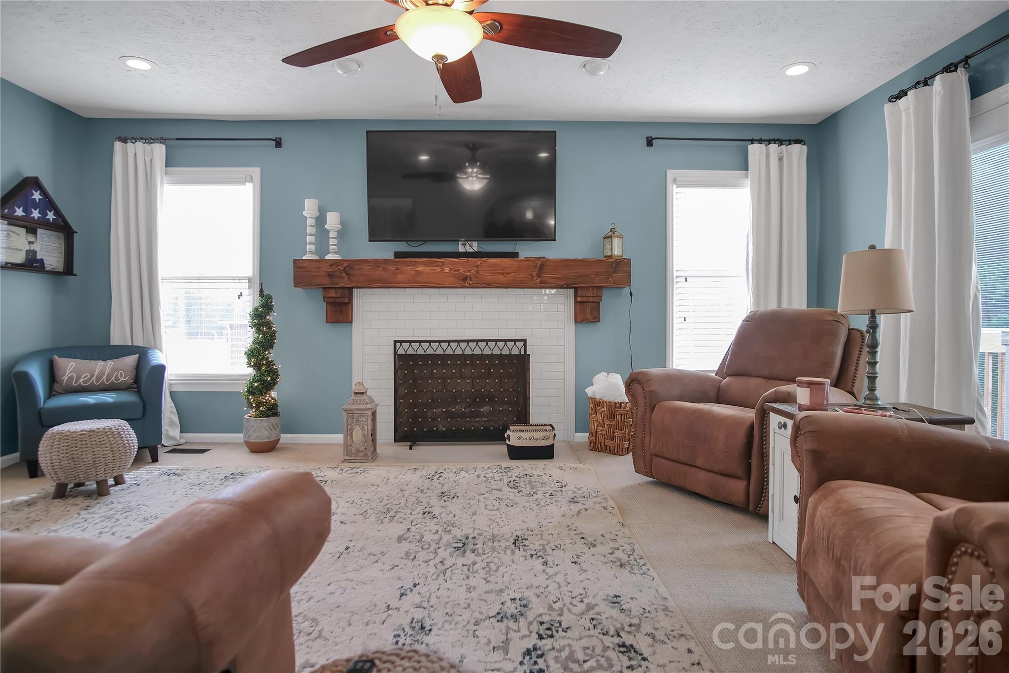 120 Oak Point Drive Cherryville, NC 28021 - Photo 10 of 44 a living room with furniture and a fireplace