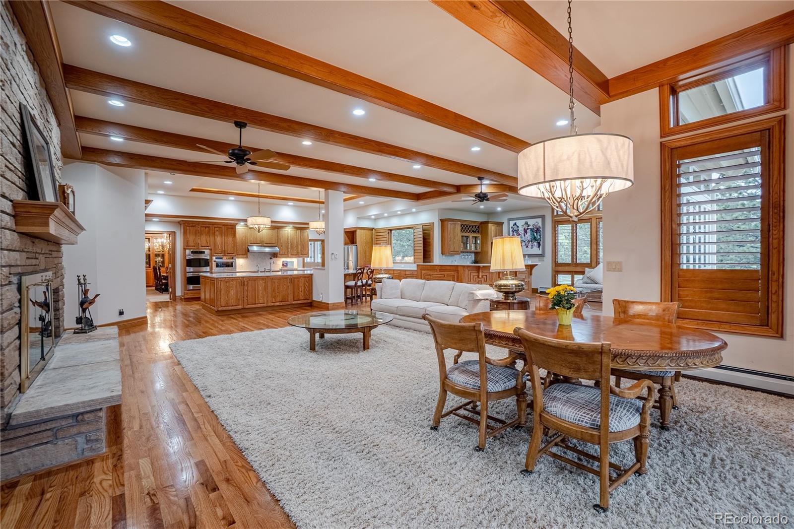 3282 Tomah Road Larkspur, CO 80118 - Photo 21 of 35 a dining room with many tables and chairs
