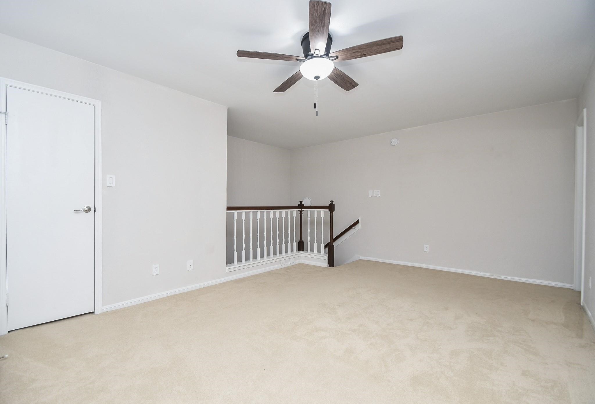 2120 El Paseo Street Houston, TX 77054 - Photo 22 of 31 en view interior of a house with a ceiling fan and window