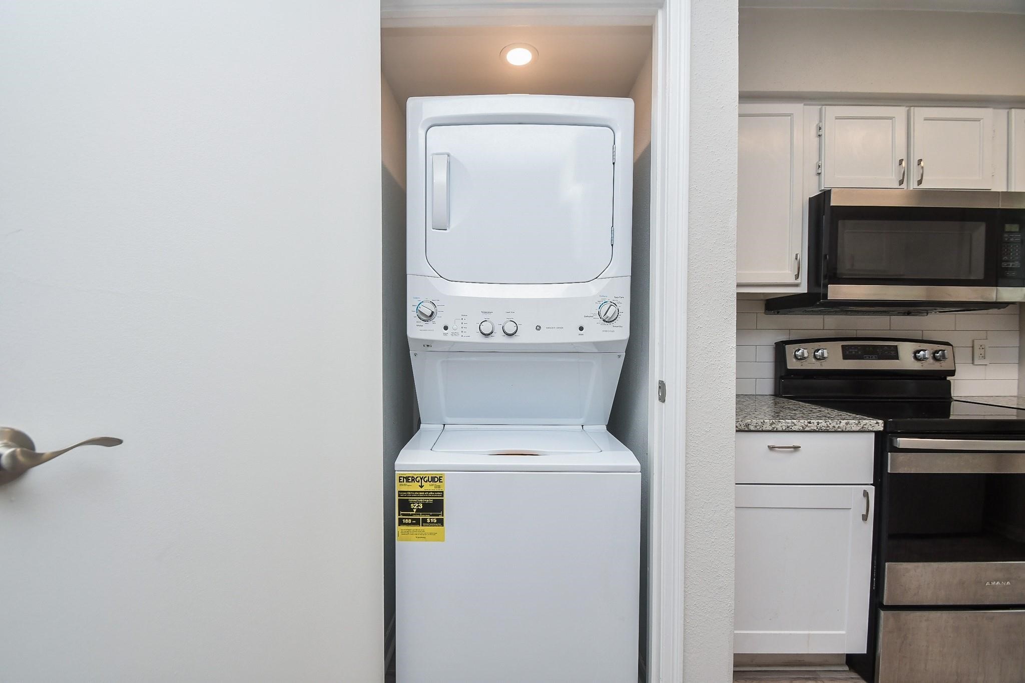 2120 El Paseo Street Houston, TX 77054 - Photo 30 of 31 a utility room with dryer and washer