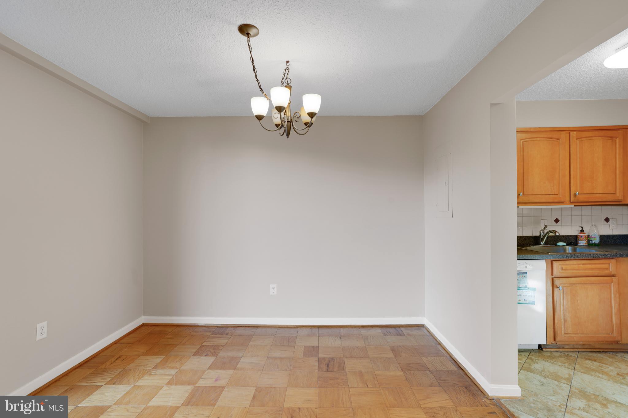 2100 Washington Avenue, Unit 2B Silver Spring, MD 20910 - Photo 13 of 34 a view of a kitchen with a sink dishwasher and microwave
